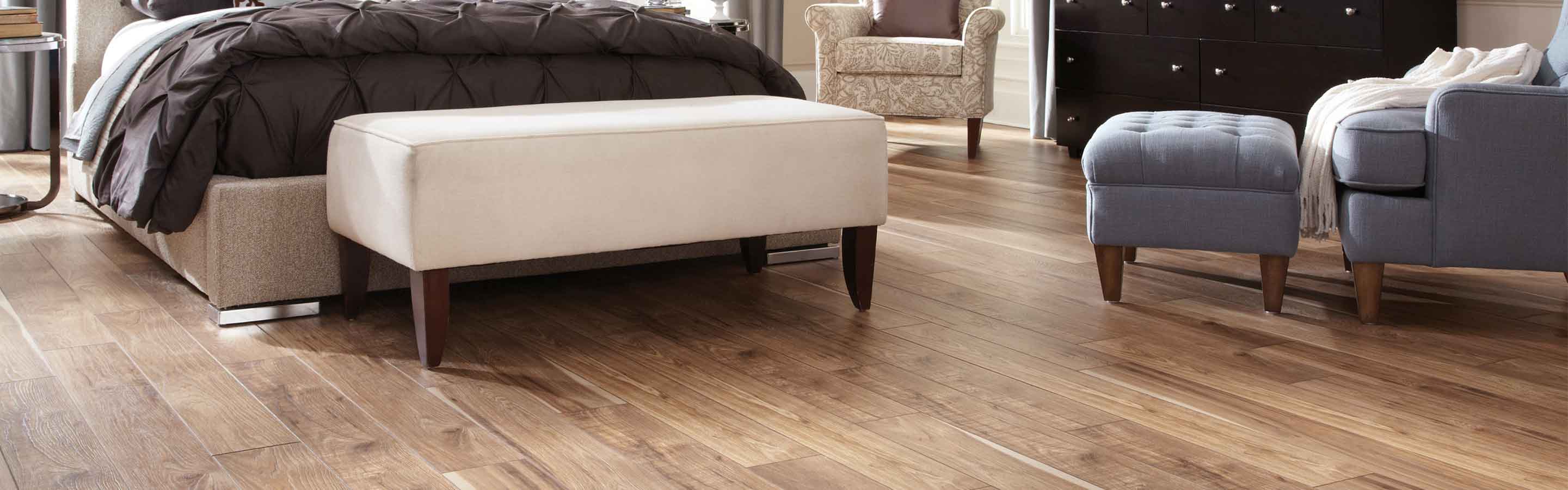 laminate wood look flooring laminate flooring in living area with armchair