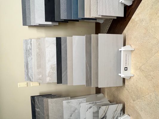 Tile samples in neutral shades. 