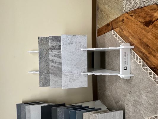 Natural patterned stone tile in our showroom. .